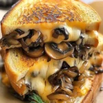 Grilled cheese sandwiches are a timeless comfort food, but this recipe elevates the classic with the nutty richness of gouda, the earthiness of roasted mushrooms, and the sweetness of caramelized onions. Whether you're looking for a quick meal or a satisfying snack, this gourmet twist is sure to impress. Let’s explore how to craft this delectable dish step by step.