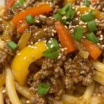 Dive into the rich flavors of Mongolian Noodles with Ground Beef! This dish is not just a meal; it's a vibrant celebration of textures and tastes. Imagine tender noodles coated in a savory sauce, beef that's perfectly browned, and colorful vegetables all in one scrumptious plate. Perfect for a weeknight dinner, it’s both satisfying and quick to prepare, making it a beloved favorite for families and home cooks alike.