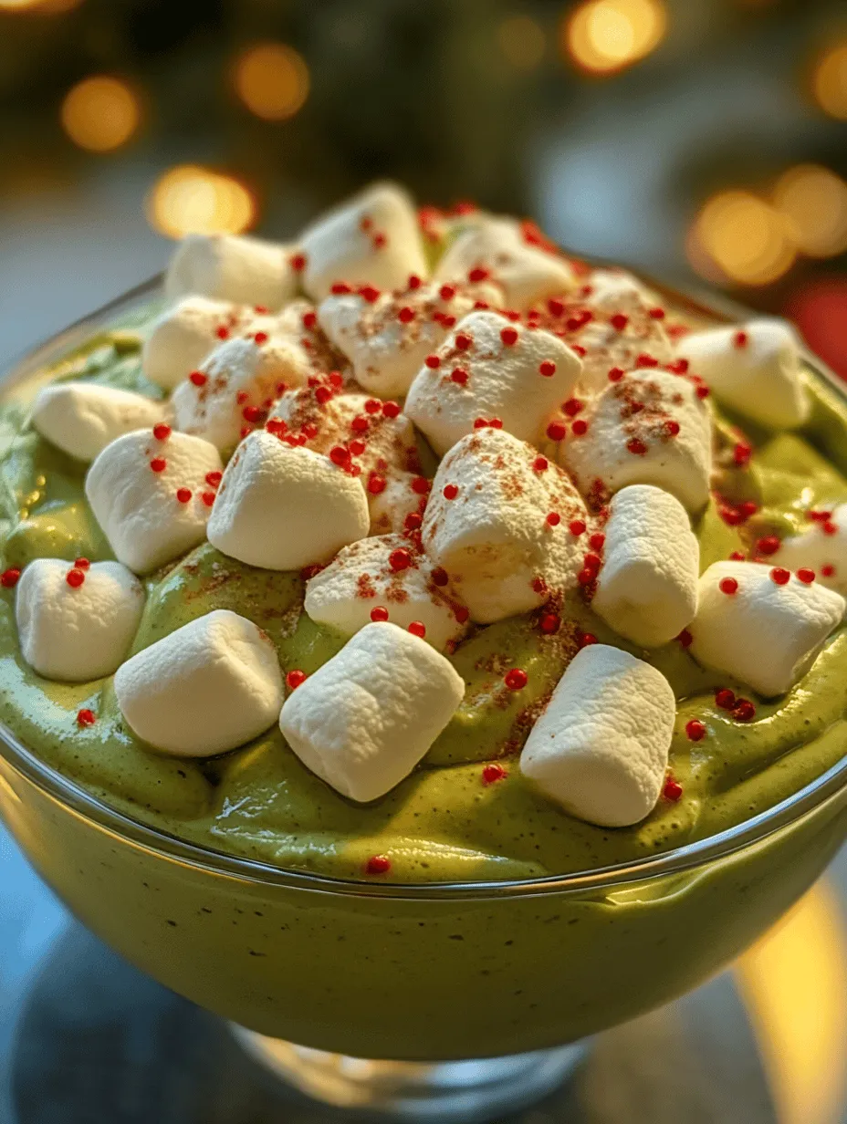 Introduce some holiday cheer with this vibrant Grinch Fluff Christmas Dessert! Picture a bowl of creamy, fluffy pistachio goodness, speckled with colorful mini marshmallows and M&M's, perfect for any Christmas gathering. This easy-to-make dessert not only brings a pop of color to your dessert table but also evokes the whimsy of Dr. Seuss's beloved character, the Grinch. With every spoonful, it’s like capturing the spirit of Christmas in a bowl, making it an instant hit for both kids and adults alike!