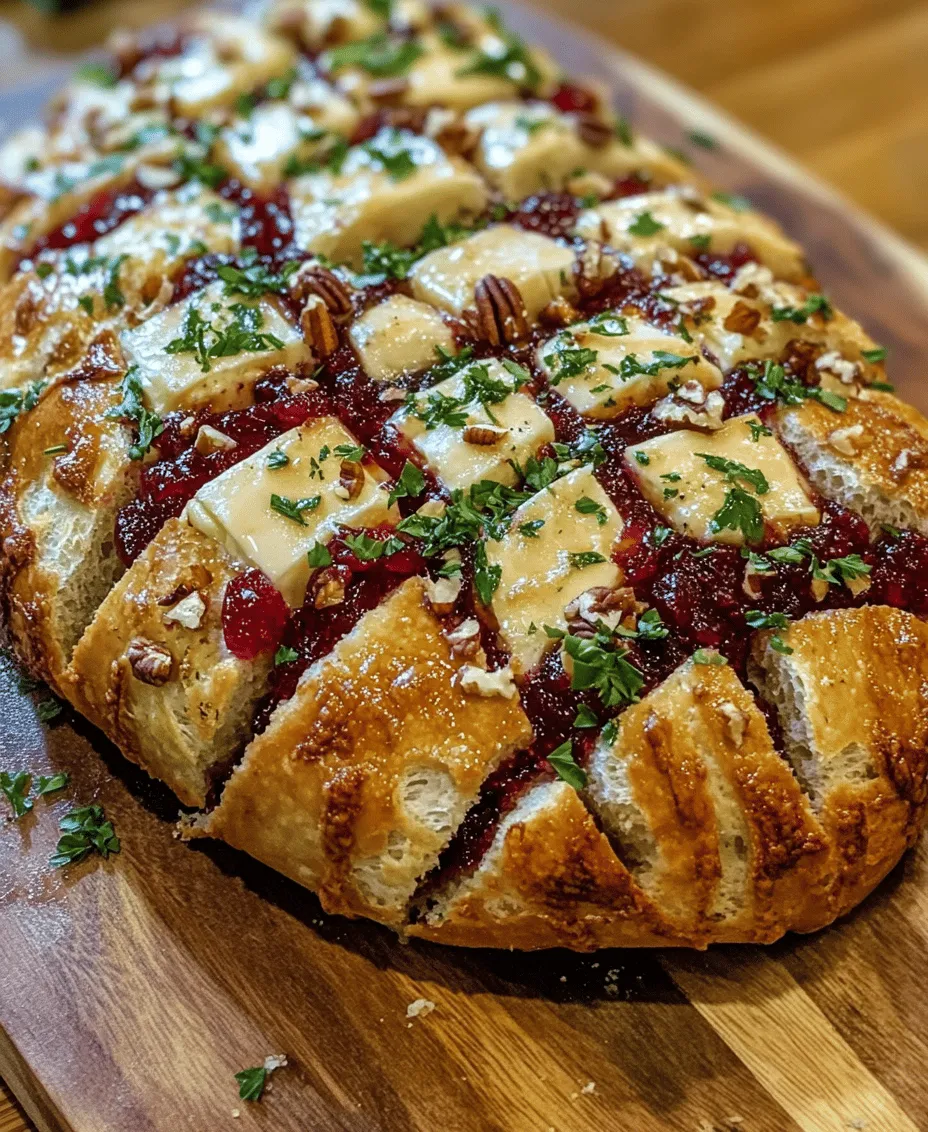 Pull-apart bread has taken the culinary world by storm, becoming a popular choice for social gatherings and holiday celebrations. This delightful dish not only serves as an impressive centerpiece on any table but also invites guests to indulge in a shared experience, making it perfect for festive occasions like Thanksgiving, Christmas, or casual get-togethers. Among the various iterations of this beloved bread, <strong>Cranberry Brie Sourdough Pull-Apart Bread</strong> stands out as a unique combination of flavors that is both savory and slightly sweet—a true testament to the beauty of seasonal ingredients.” /></p>
</p>
<h3>Best Practices for Evenly Distributing Brie and Cranberry Mixture</h3>
</p>
<p>When crafting your Cranberry Brie Sourdough Pull-Apart Bread, the key to achieving a delightful burst of flavor in every bite lies in how you distribute the Brie and cranberry mixture. To ensure that each piece of bread is equally delightful, consider the following best practices:</p>
</p>
<p>1. <strong>Cut the Bread Carefully</strong>: Begin by making even slices into the sourdough loaf, but don’t cut all the way through. Leave about half an inch at the bottom intact. This will allow the slices to hold together while still being able to pull apart.</p>
</p>
<p>2. <strong>Use a Spoon for Spreading</strong>: Take a spoon and carefully dollop the cranberry mixture into each cut. Make sure to push it gently into the crevices. A small offset spatula can also help spread the mixture evenly without disrupting the structure of the bread.</p>
</p>
<p>3. <strong>Layer the Brie Strategically</strong>: After adding the cranberry sauce, place pieces of Brie in between the cranberry filling. Make sure to distribute the cheese evenly across the loaf, avoiding clumps in any one section. This will ensure a nice gooeyness in each pull-apart piece.</p>
</p>
<p>4. <strong>Top it Off</strong>: Once you’ve stuffed all the slices, consider adding a bit of leftover cranberry mixture and cheese on top of the loaf to create an appealing visual effect. This topping will melt beautifully during baking, adding to the overall flavor experience.</p>
</p>
<h3>Importance of Layering Flavors and Textures</h3>
</p>
<p>Layering flavors and textures is crucial in creating a balanced and satisfying dish. The creamy, rich Brie contrasts beautifully with the tartness of the cranberries, while the crusty sourdough provides a hearty base. Here’s how to enhance this layering:</p>
</p>
<p>– <strong>Incorporate Nuts</strong>: Adding chopped walnuts or pecans to the cranberry mixture can introduce a delightful crunch, enriching the flavor profile while providing a contrast to the soft Brie and chewy sourdough.</p>
</p>
<p>– <strong>Use Fresh Herbs</strong>: Consider mixing in fresh herbs like thyme or rosemary into the cranberry filling. These herbs will add aromatic notes that elevate the overall taste of the bread.</p>
</p>
<p>– <strong>Seasoning the Bread</strong>: A sprinkle of salt and pepper over the assembled loaf before baking can enhance the flavors and balance the sweetness of the cranberries.</p>
</p>
<h3>Discussing the Seasoning Process</h3>
</p>
<p>The seasoning process is essential for enhancing the flavors of your pull-apart bread. Here’s how to effectively incorporate seasoning:</p>
</p>
<p>1. <strong>Brushing with Butter</strong>: Before baking, brush the top and sides of the loaf with melted butter. This not only adds flavor but also helps to achieve a golden-brown crust.</p>
</p>
<p>2. <strong>Add Sea Salt</strong>: A fine sprinkling of coarse sea salt over the buttered surface can emphasize the sweetness of the cranberries and the creaminess of the cheese, creating a delightful contrast.</p>
</p>
<p>3. <strong>Seasoning Variations</strong>: Feel free to experiment with seasonings like garlic powder, onion powder, or even a touch of cinnamon to add warmth and depth to the overall flavor.</p>
</p>
<h3>Baking the Bread</h3>
</p>
<p>Baking is where all your efforts come together, transforming your raw ingredients into a beautiful, aromatic pull-apart bread. Here are some insights into the baking process:</p>
</p>
<h4>Importance of Covering the Bread</h4>
</p>
<p>To prevent over-browning in the initial baking stages, it’s essential to cover the bread with aluminum foil during the first half of the baking time. This allows the bread to cook through without the crust darkening too quickly. After about 20-25 minutes, you can remove the foil to allow the top to turn a gorgeous golden brown.</p>
</p>
<h4>How to Determine When the Bread is Perfectly Baked</h4>
</p>
<p>The perfect pull-apart bread should be golden brown on the top, and the cheese should be bubbly and slightly oozy. To check for doneness, you can use the following methods:</p>
</p>
<p>– <strong>Visual Cues</strong>: Look for a uniform golden-brown color on the top of the loaf. The crust should be firm to the touch but not overly hard.</p>
</p>
<p>– <strong>Gooey Cheese Test</strong>: A quick peek inside the cuts of the bread should reveal melted cheese. If you can see the cheese bubbling and oozing slightly out of the cuts, it’s a good indication that the bread is ready to come out of the oven.</p>
</p>
<h3>Serving Suggestions</h3>
</p>
<p>Once your Cranberry Brie Sourdough Pull-Apart Bread is baked to perfection, it’s time to serve it up! Here are some ideas to elevate your serving experience:</p>
</p>
<h4>Pairings with Wines or Beverages</h4>
</p>
<p>The rich, creamy flavors of the Brie and the tartness of the cranberries pair beautifully with various beverages. Consider serving your bread with:</p>
</p>
<p>– <strong>White Wines</strong>: A light Chardonnay or a Sauvignon Blanc can enhance the flavors of the dish while providing a refreshing contrast.</p>
</p>
<p>– <strong>Sparkling Wine</strong>: Champagne or Prosecco adds a festive touch and complements the richness of the cheese and the sweetness of the cranberries.</p>
</p>
<p>– <strong>Non-Alcoholic Options</strong>: Sparkling apple cider or a berry-infused iced tea can also provide a delightful pairing without the alcohol.</p>
</p>
<h4>Side Dishes That Complement the Bread</h4>
</p>
<p>While the pull-apart bread can certainly stand alone, pairing it with side dishes can round out your meal. Consider:</p>
</p>
<p>– <strong>Simple Salad</strong>: A mixed green salad with a light vinaigrette can offer a refreshing contrast to the rich bread.</p>
</p>
<p>– <strong>Soup</strong>: A warm bowl of butternut squash or tomato basil soup can make for a comforting meal, perfect for colder months.</p>
</p>
<h4>Presentation Tips for a Festive Look</h4>
</p>
<p>Presentation can elevate your dish from ordinary to extraordinary. Here are a few tips:</p>
</p>
<p>– <strong>Garnish with Fresh Parsley</strong>: A sprinkle of fresh parsley or thyme leaves can add a pop of color and freshness to your bread.</p>
</p>
<p>– <strong>Serve on a Wooden Board</strong>: Placing your pull-apart bread on a rustic wooden board can create a charming centerpiece for your table.</p>
</p>
<p>– <strong>Use a Bread Knife for Serving</strong>: To keep the presentation neat, use a serrated knife to cut the bread into manageable pieces directly from the loaf.</p>
</p>
<h3>Nutritional Information</h3>
</p>
<p>Understanding the nutritional benefits of your ingredients can enhance your appreciation for this delicious bread. Here’s a brief overview:</p>
</p>
<p>– <strong>Calories and Macros per Serving</strong>: Each serving of Cranberry Brie Sourdough Pull-Apart Bread (assuming 12 servings) is estimated to contain around 250-300 calories. The macros can vary depending on the specific ingredients used but typically include approximately 10g of protein, 15g of fat, and 30g of carbohydrates.</p>
</p>
<p>– <strong>Health Benefits of Cranberries and Nuts</strong>: Cranberries are rich in antioxidants and can contribute to heart health, while nuts like walnuts and pecans provide healthy fats and proteins. Including these in your diet can promote overall well-being.</p>
</p>
<h3>Conclusion</h3>
</p>
<p>Cranberry Brie Sourdough Pull-Apart Bread is a culinary delight that perfectly balances savory and sweet flavors, offering a comforting and indulgent treat. With its gooey cheese, tart cranberries, and crusty sourdough, this recipe is perfect for gatherings or as a cozy evening snack during the colder months.</p>
</p>
<p>Baking homemade bread not only fills your home with delightful aromas but also creates a sense of warmth and togetherness. So, gather your loved ones, try this recipe, and experience the joy that comes from sharing delicious food. Whether for a holiday feast or a simple family dinner, this pull-apart bread will undoubtedly be a hit. Embrace the joy of cooking and enjoy every delicious moment!</p>
</div>