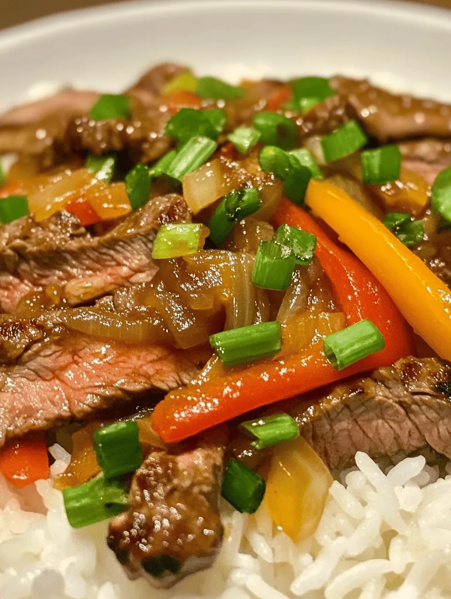 Sizzling Pepper Steak Stir-Fry is a vibrant and savory dish that brings together tender flank steak, colorful bell peppers, and a medley of aromatic spices. This dish is not only a feast for the eyes but also a delight for the palate, making it an ideal choice for busy weeknights or special occasions. The appeal of this dish lies in its quick cooking time, allowing you to whip up an impressive meal in a matter of minutes.